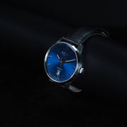 Luxury watch (195.10.201.01): watch face angled view right zoomed out